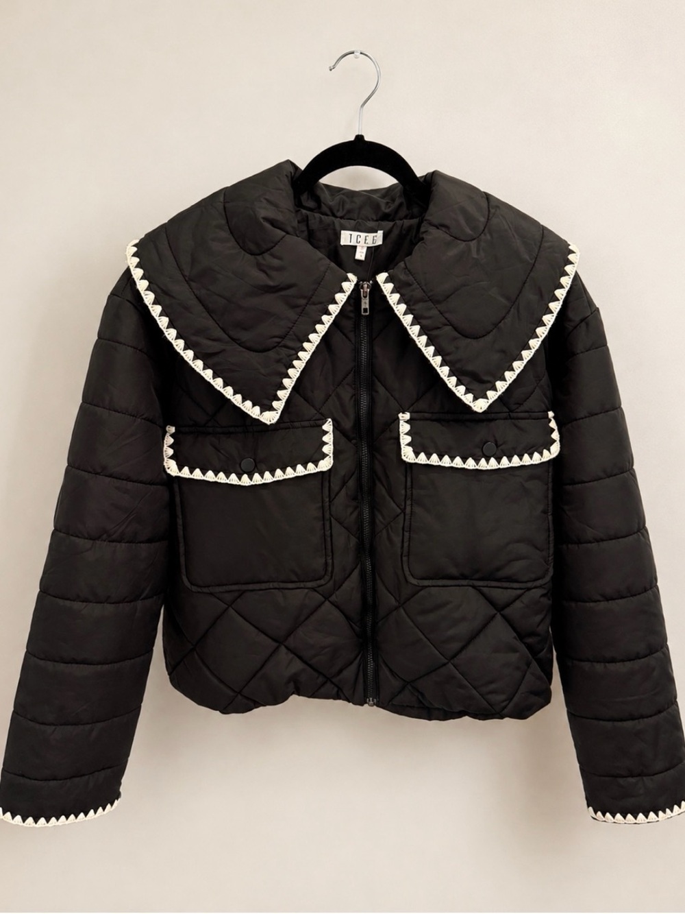 TCEC Black Quilted Puffer Jacket with White Trim